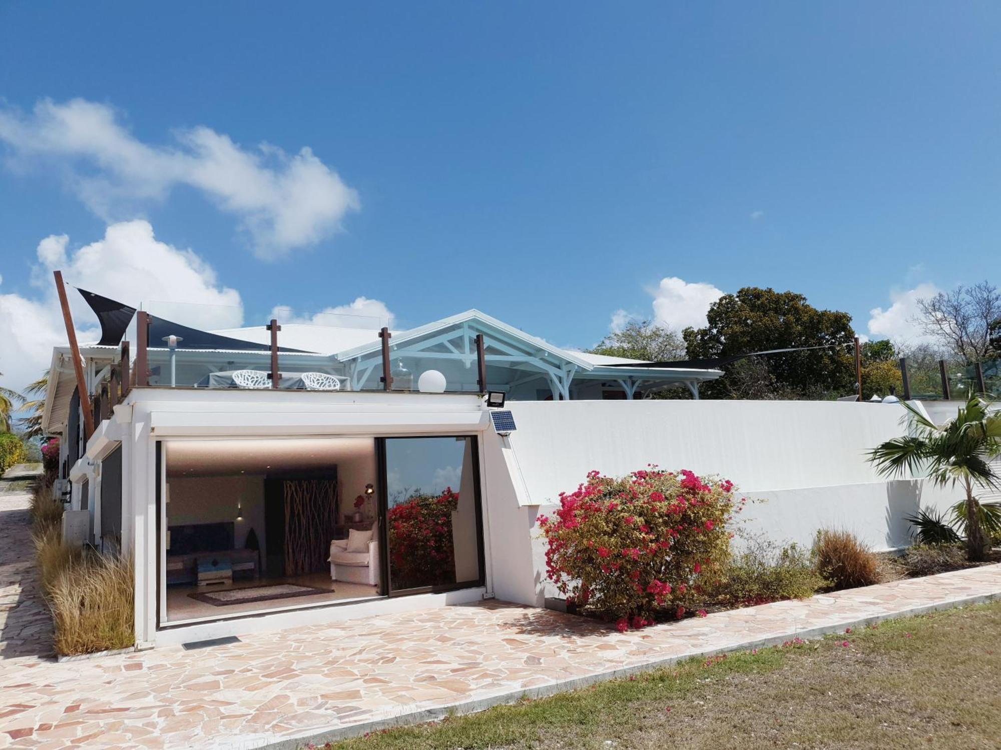 Villa Deluxe L'Hacienda Villa Vue Mer 180 Piscine Jacuzzi Proche Plage Marina Golf Pointe Des Chateaux Et Casino Jardin Clos Voyage Durable Saint-Francois  Room photo