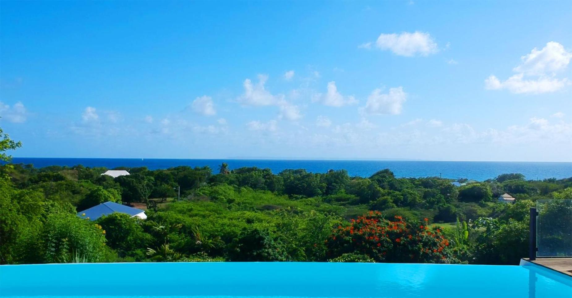 Villa Deluxe L'Hacienda Villa Vue Mer 180 Piscine Jacuzzi Proche Plage Marina Golf Pointe Des Chateaux Et Casino Jardin Clos Voyage Durable Saint-Francois  Room photo