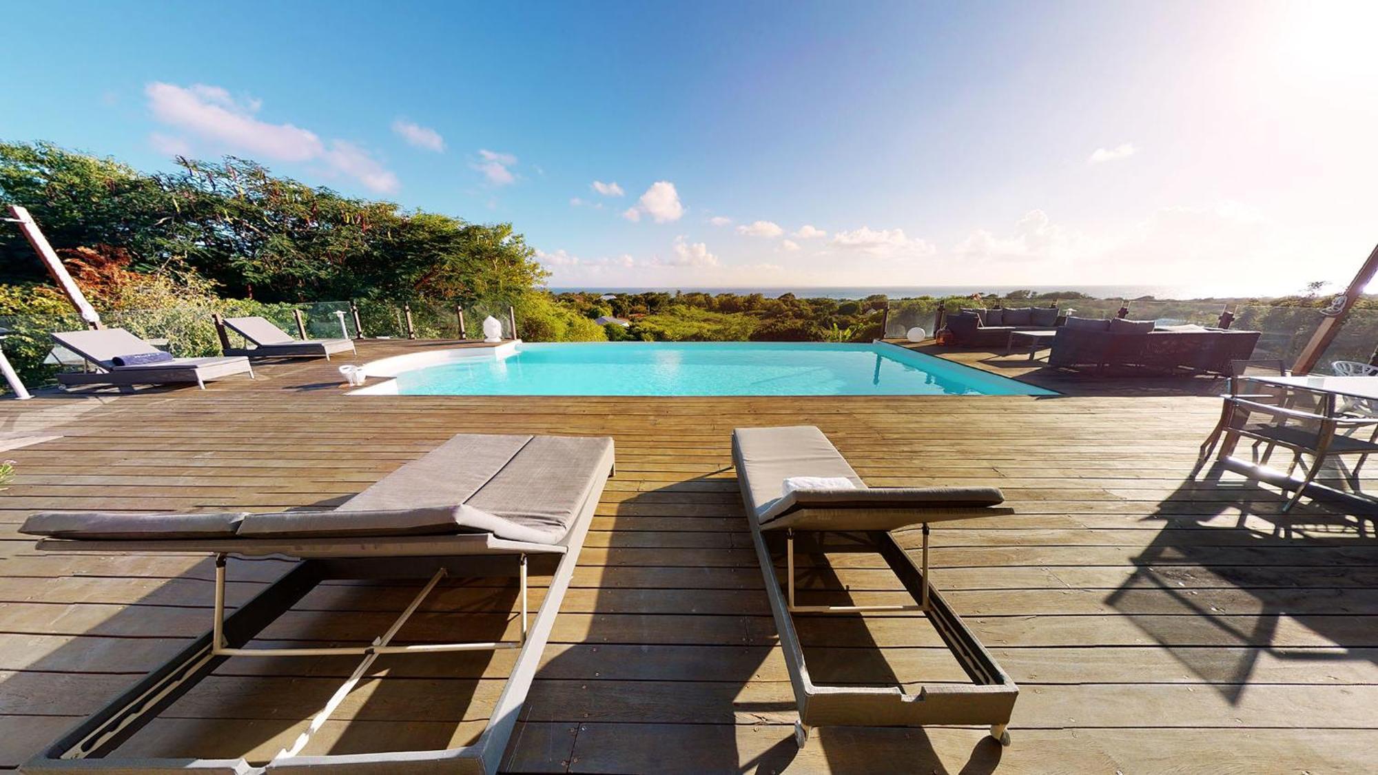 Villa Deluxe L'Hacienda Villa Vue Mer 180 Piscine Jacuzzi Proche Plage Marina Golf Pointe Des Chateaux Et Casino Jardin Clos Voyage Durable Saint-Francois  Room photo