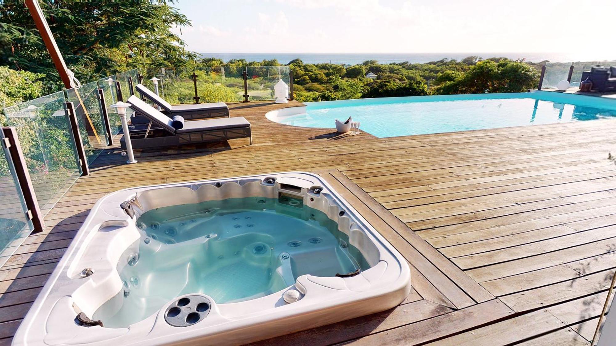 Villa Deluxe L'Hacienda Villa Vue Mer 180 Piscine Jacuzzi Proche Plage Marina Golf Pointe Des Chateaux Et Casino Jardin Clos Voyage Durable Saint-Francois  Room photo