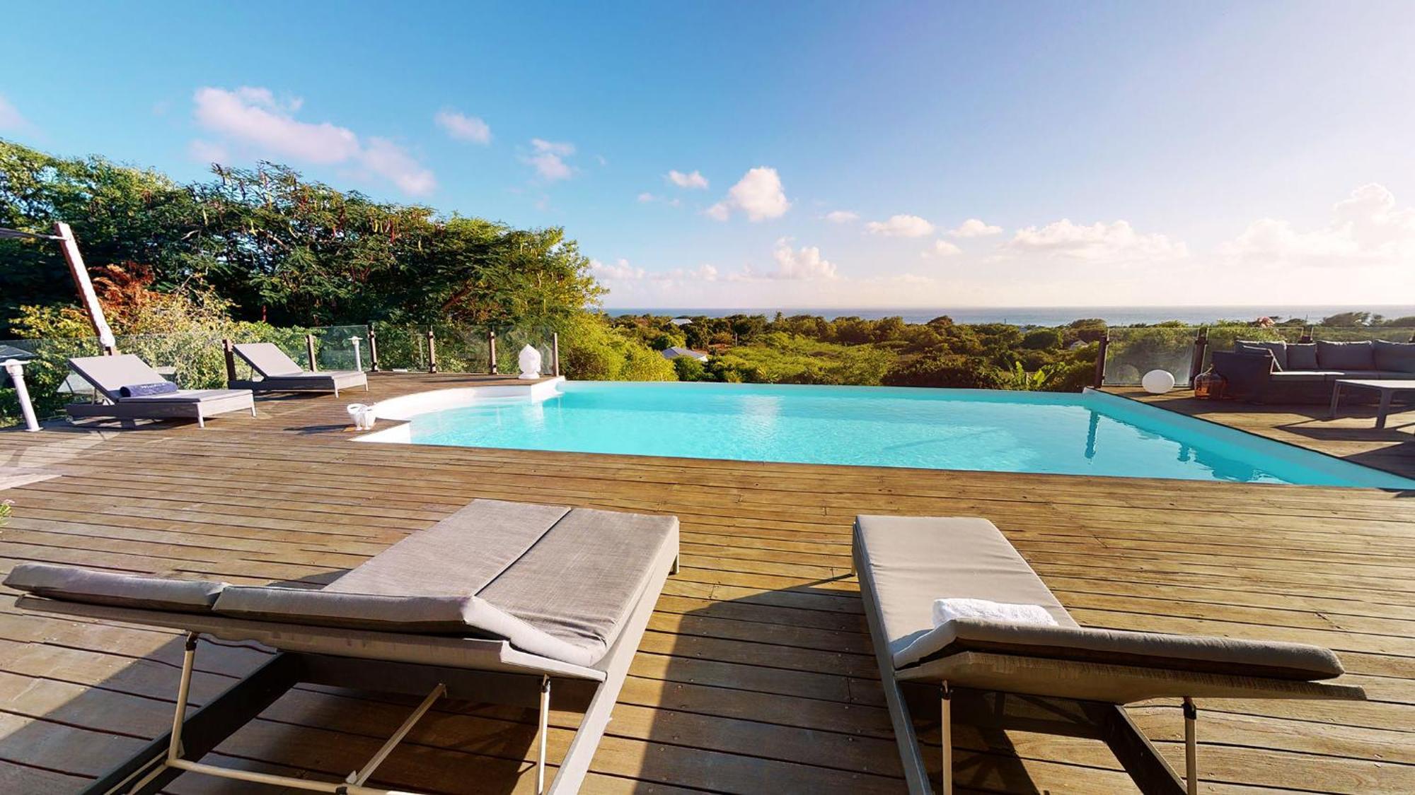 Villa Deluxe L'Hacienda Villa Vue Mer 180 Piscine Jacuzzi Proche Plage Marina Golf Pointe Des Chateaux Et Casino Jardin Clos Voyage Durable Saint-Francois  Room photo
